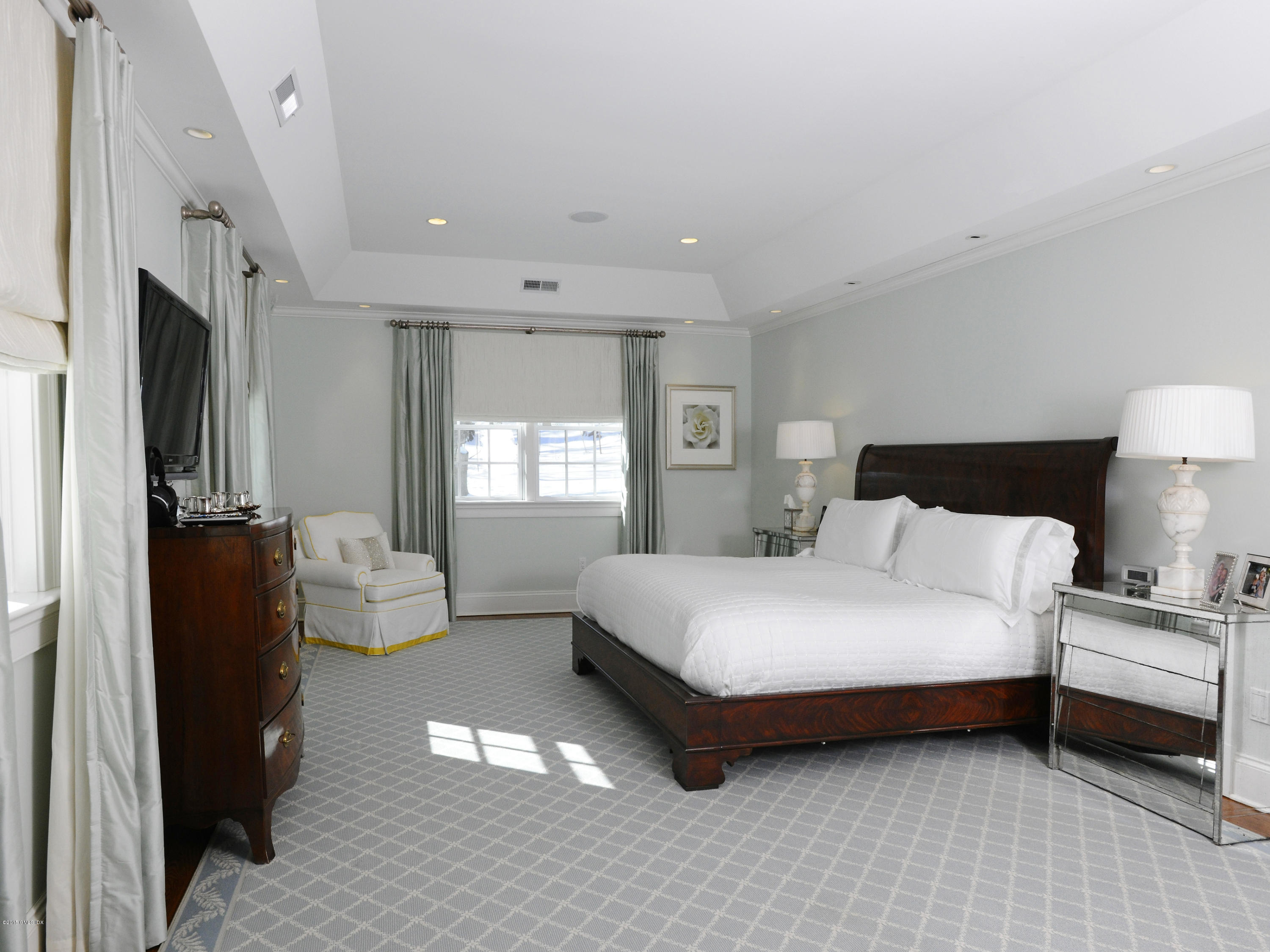 58 Brookridge Drive Greenwich, CT 06830 - Photo 13 of 18 a bedroom with a bed and a couch