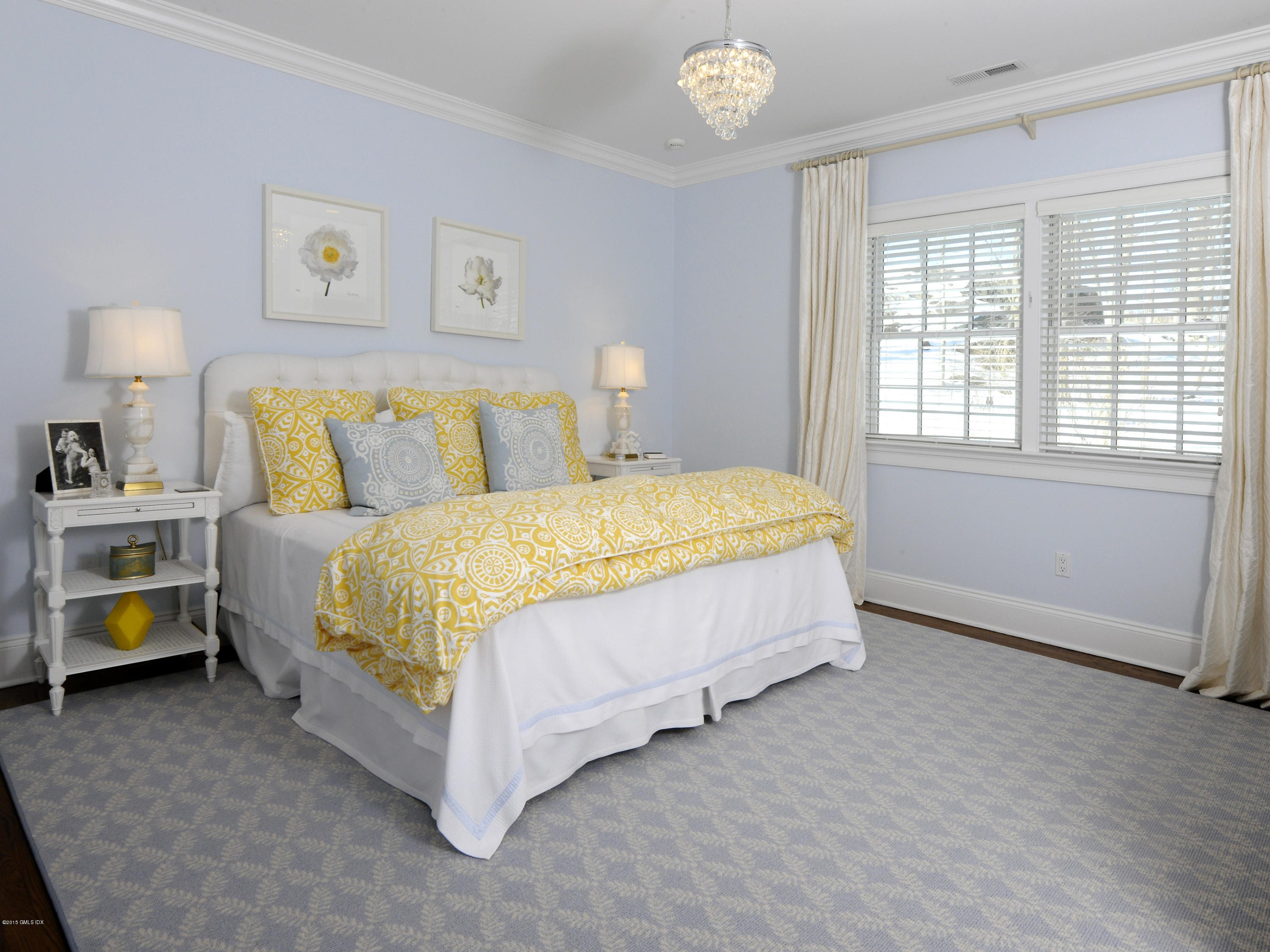 58 Brookridge Drive Greenwich, CT 06830 - Photo 15 of 18 a bed sitting in a bedroom next to a window