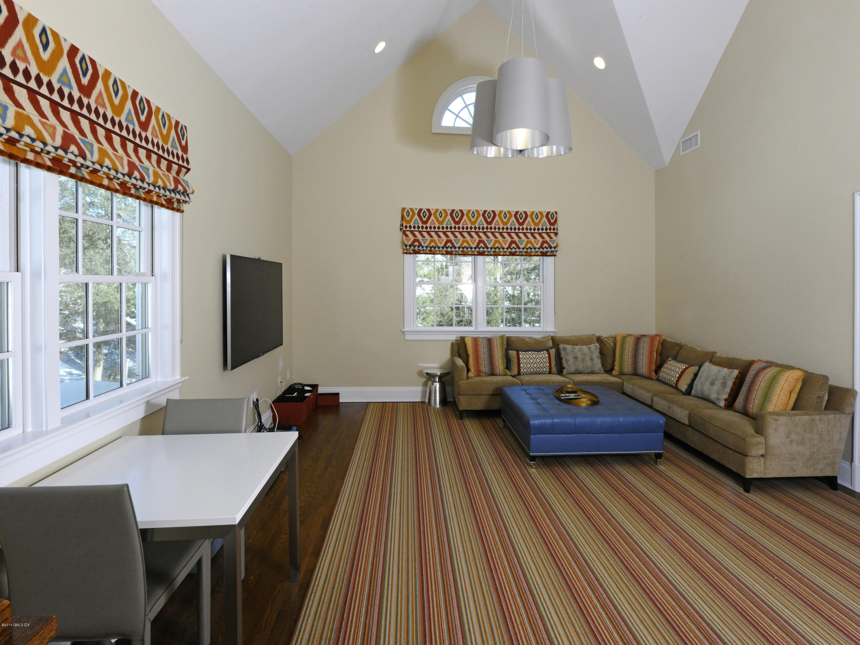 58 Brookridge Drive Greenwich, CT 06830 - Photo 16 of 18 a living room with furniture and a flat screen tv