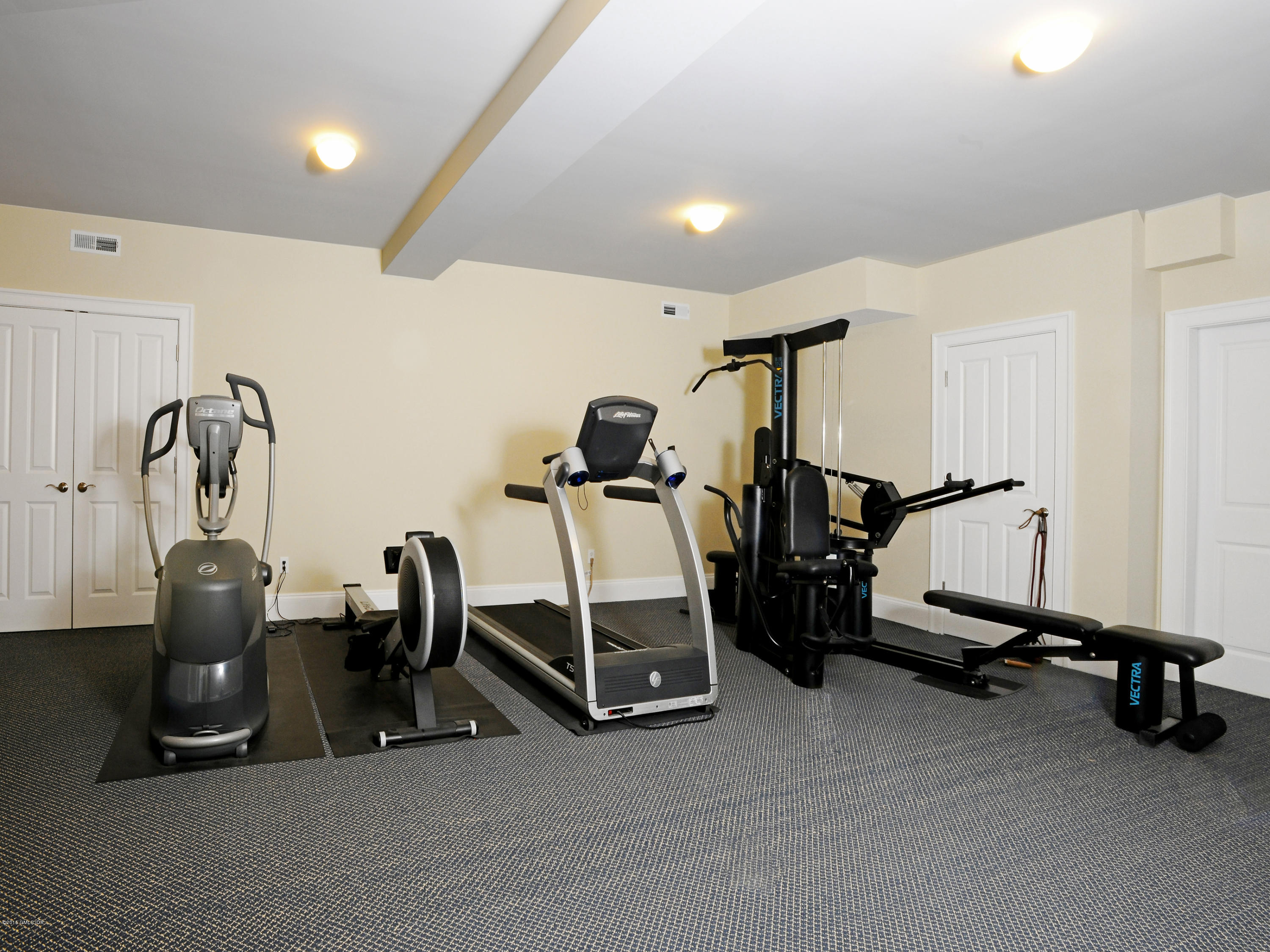 58 Brookridge Drive Greenwich, CT 06830 - Photo 18 of 18 a view of a room with gym equipment