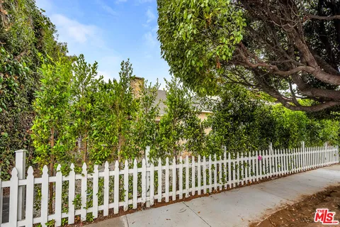 a view of a wooden fence