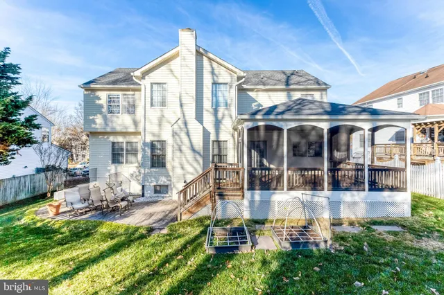 a view of pool with brick walls