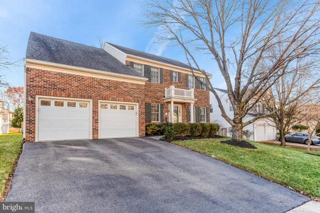 a view of a building with a yard