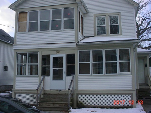 98-100 Draper Street Springfield, MA 01108 - Photo 1 of 4 a front view of a house with a door