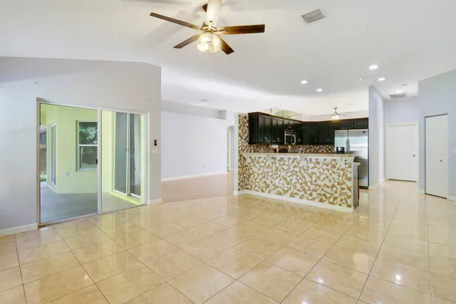 a view of an entryway with a kitchen