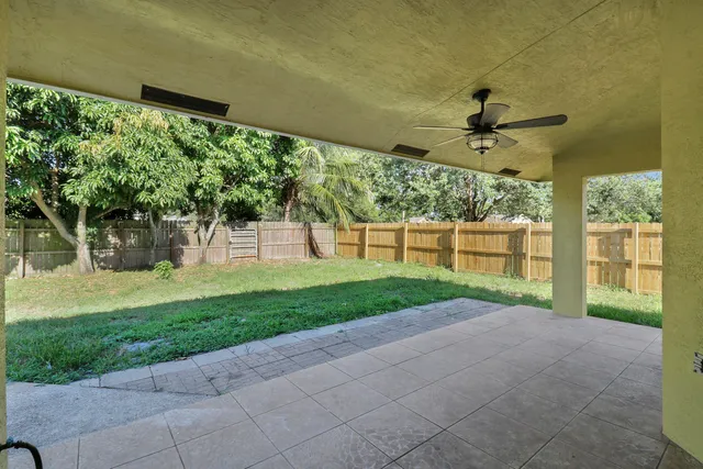 a view of a porch and garden