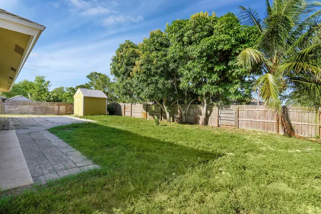 a house view with a garden space