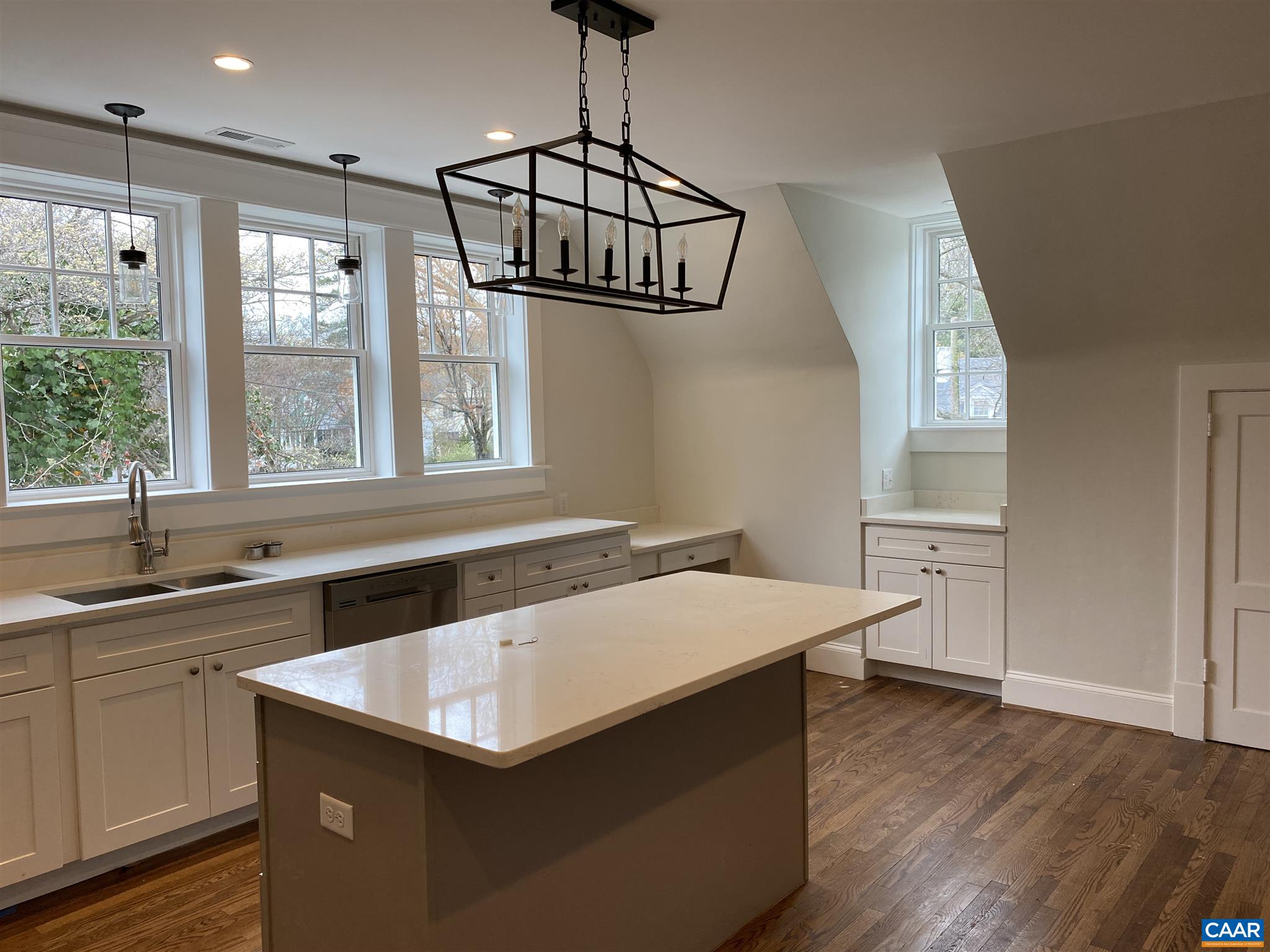 1928 Lewis Mountain Road, Unit B Charlottesville, VA 22903 - Photo 15 of 22 a kitchen that has a sink a window and stainless steel appliances