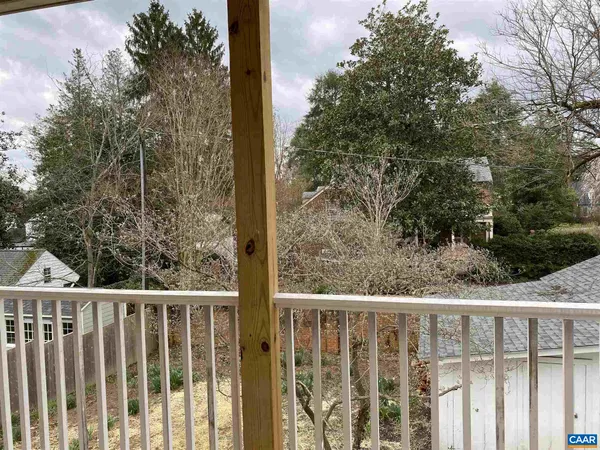 a view of a wooden fence