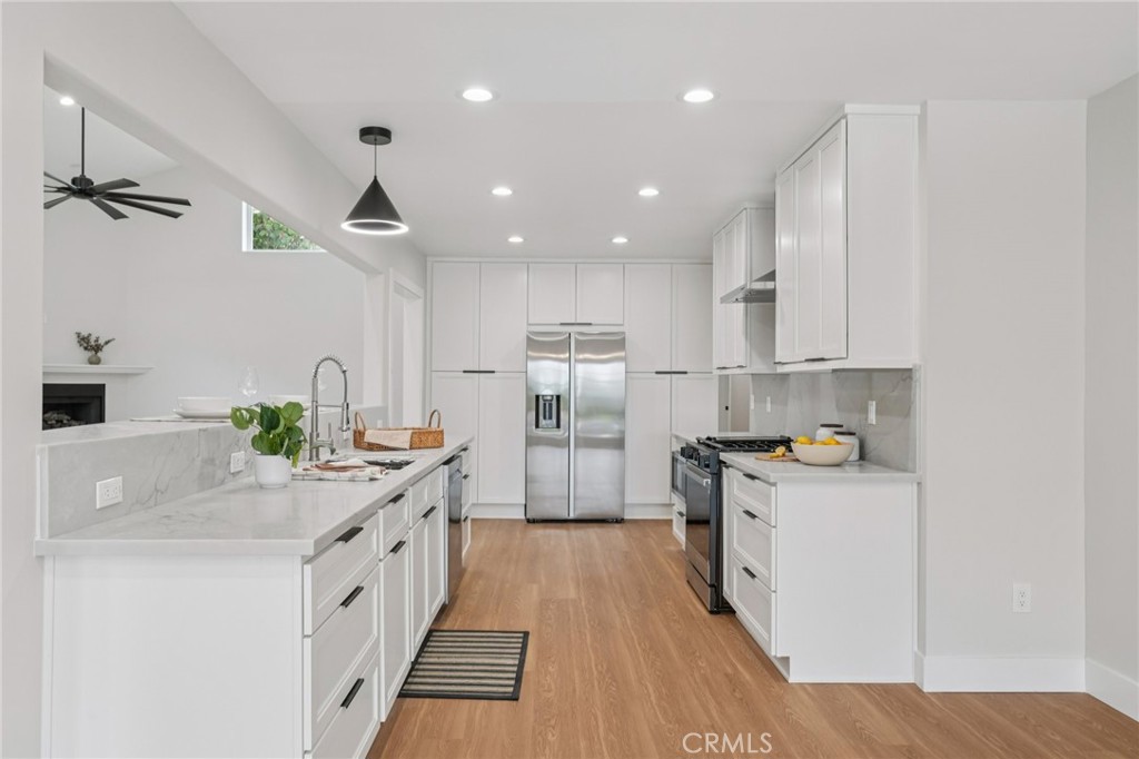 20 Saddle Road Rancho Palos Verdes, CA 90275 - Photo 12 of 44 a kitchen with stainless steel appliances granite countertop a sink stove and refrigerator