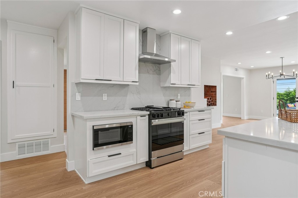 20 Saddle Road Rancho Palos Verdes, CA 90275 - Photo 14 of 44 a kitchen with stainless steel appliances granite countertop a stove a sink and a refrigerator