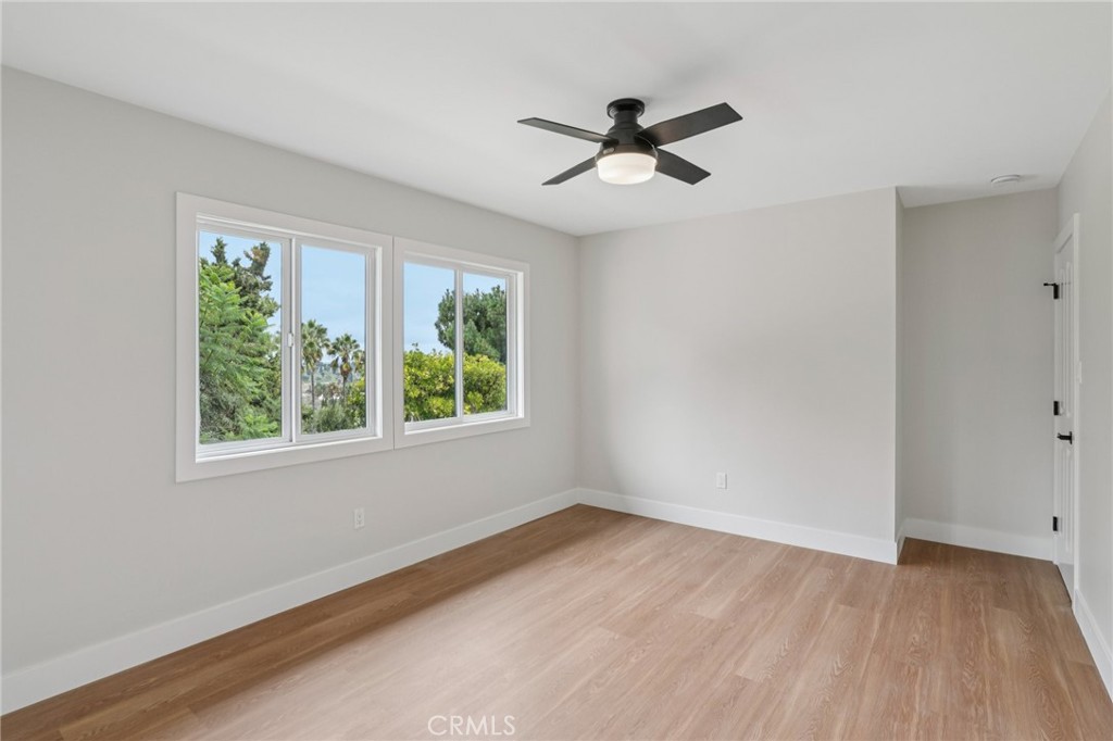 20 Saddle Road Rancho Palos Verdes, CA 90275 - Photo 24 of 44 a view of empty room with wooden floor and fan
