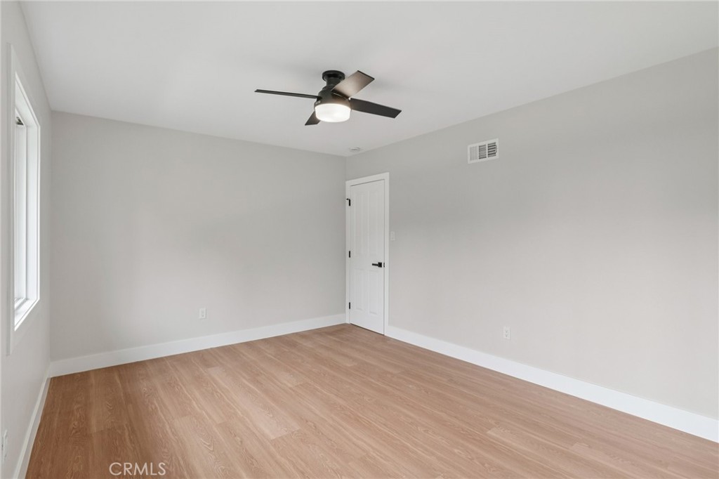 20 Saddle Road Rancho Palos Verdes, CA 90275 - Photo 26 of 44 an empty room with wooden floor and ceiling fan