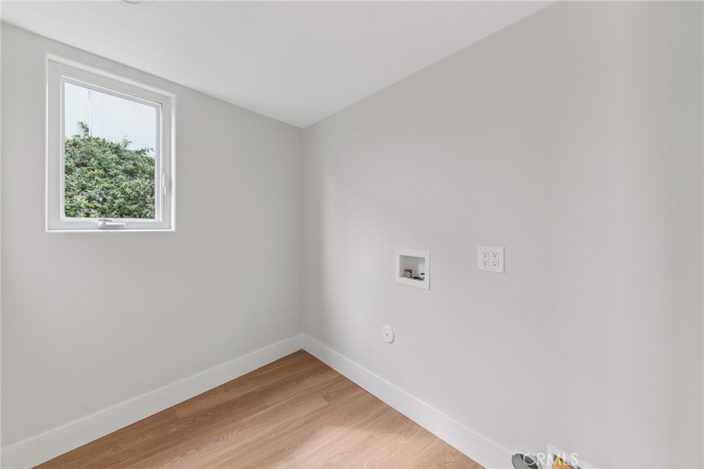 20 Saddle Road Rancho Palos Verdes, CA 90275 - Photo 29 of 44 a view of an empty room with wooden floor and a window