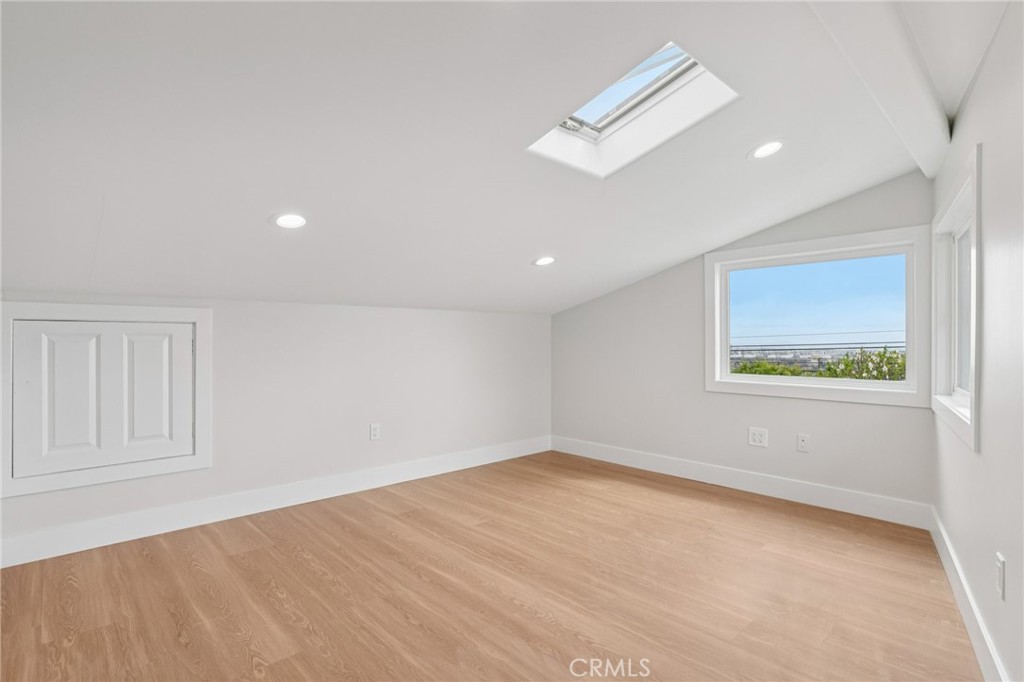 20 Saddle Road Rancho Palos Verdes, CA 90275 - Photo 32 of 44 wooden floor in an empty room with a window
