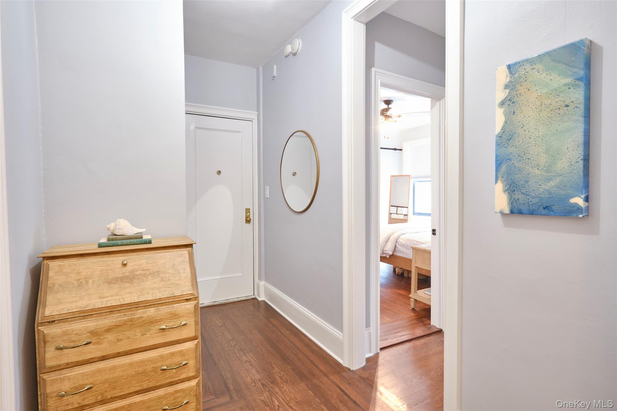 244 Bronxville Road, Unit G3 Bronxville, NY 10708 - Photo 14 of 18 a view of a hallway with closet and wooden floor