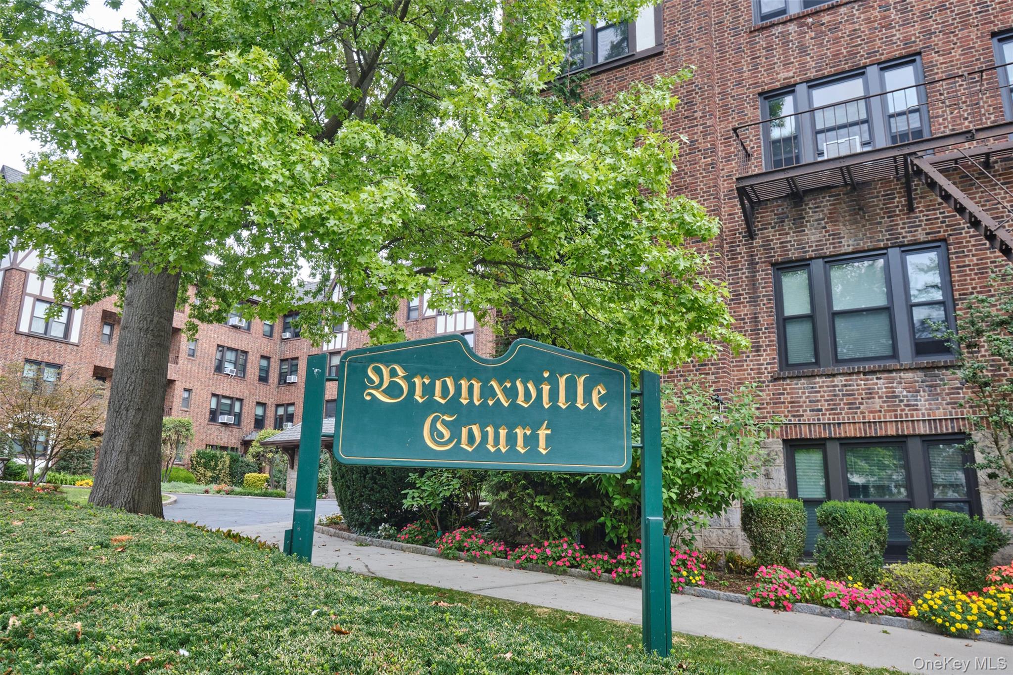 244 Bronxville Road, Unit G3 Bronxville, NY 10708 - Photo 15 of 18 a sign on the side of a building