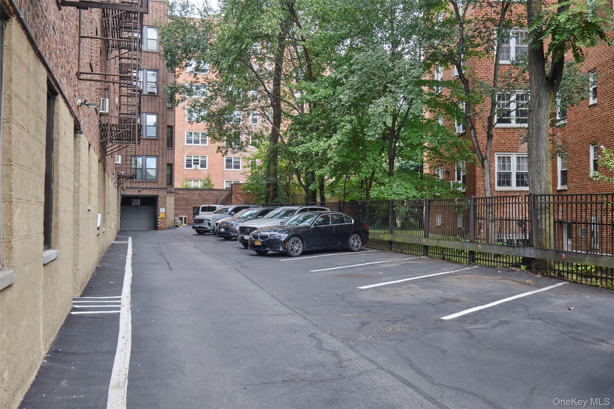244 Bronxville Road, Unit G3 Bronxville, NY 10708 - Photo 17 of 18 a car parked on the side of a street