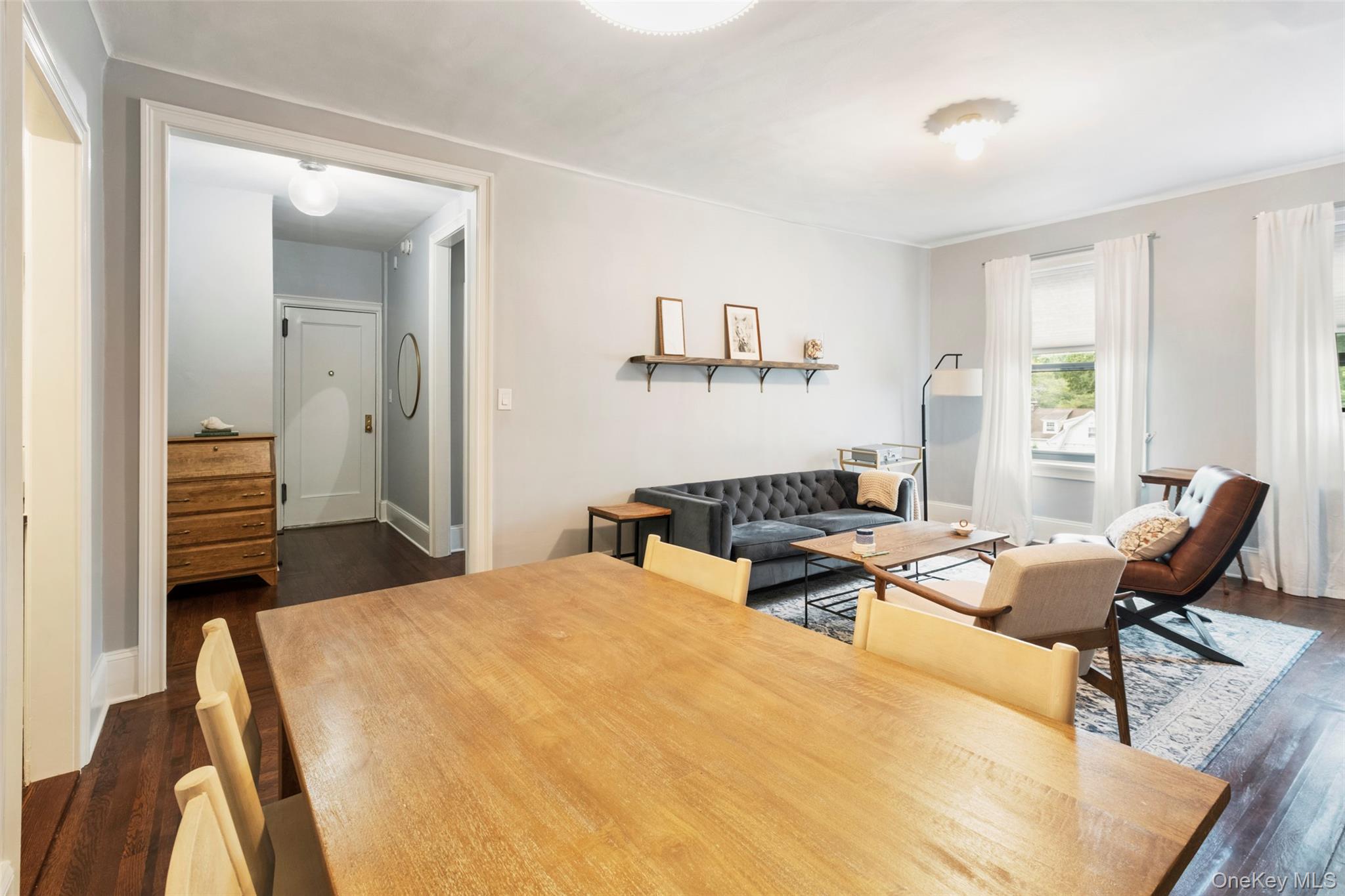 244 Bronxville Road, Unit G3 Bronxville, NY 10708 - Photo 2 of 18 a bedroom with a bed and furniture