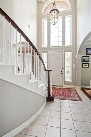 a view of an entryway with a front door