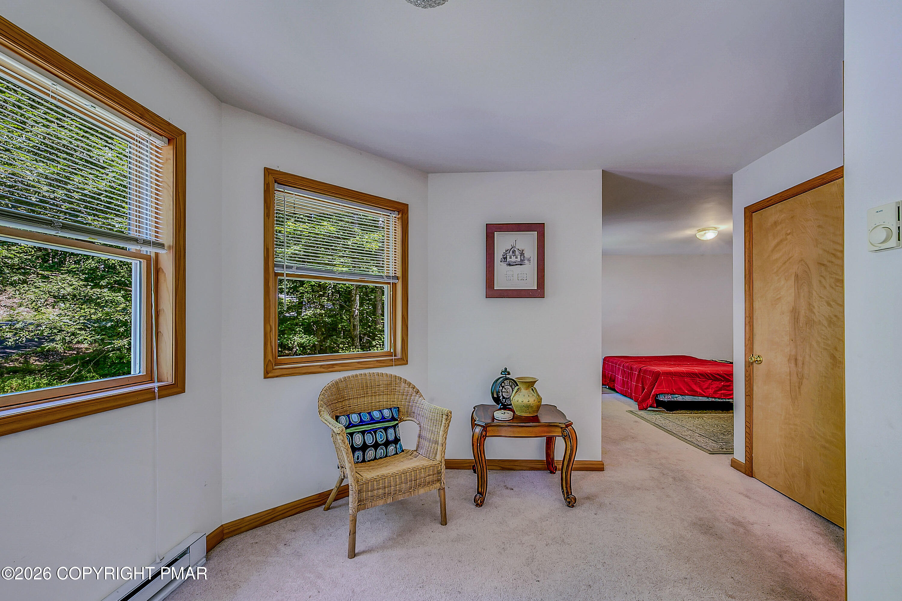 164 Bellingham Drive Bushkill, PA 18324 - Photo 19 of 46 Primary Bedroom Seating Area