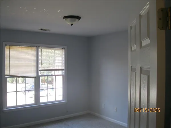 an empty room with windows