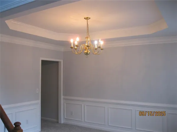 a view of livingroom with chandelier