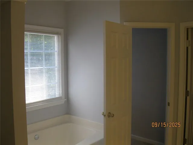a bathroom with a bathtub