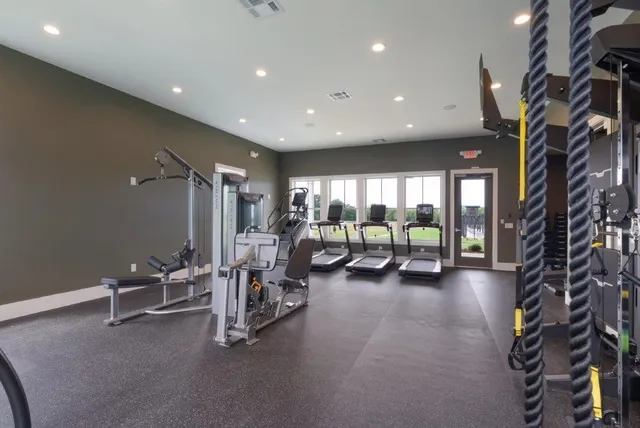 a view of a room with gym equipment