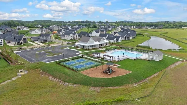 a view of a lake with a yard