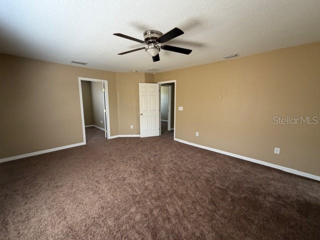 7514 Dragon Fly Loop Gibsonton, FL 33534 - Photo 6 of 11 a view of a livingroom with a ceiling fan
