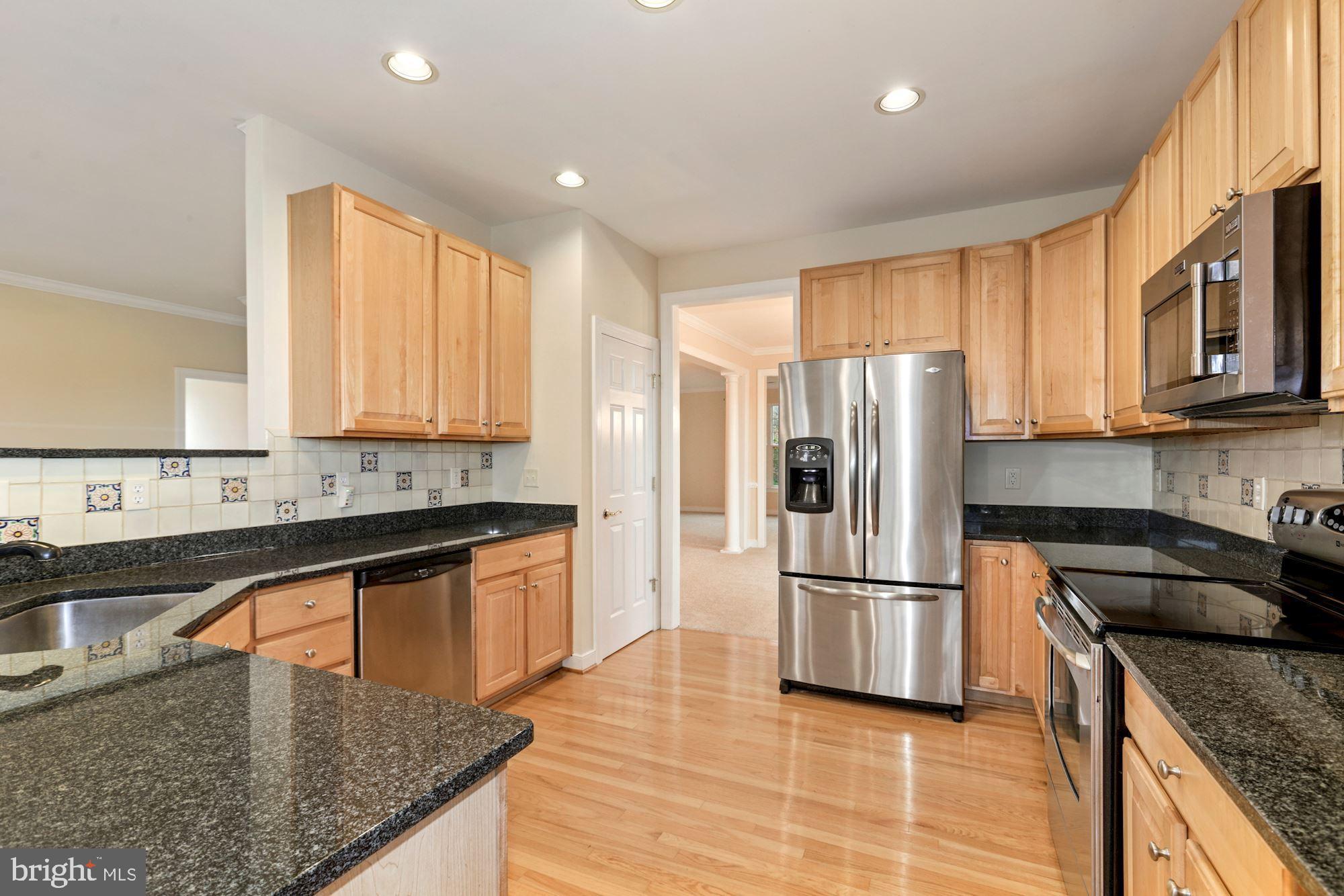 24873 Rivers Edge Road Millsboro, DE 19966 - Photo 17 of 57 Gorgeous Kitchen | Stainless Steel Appliances