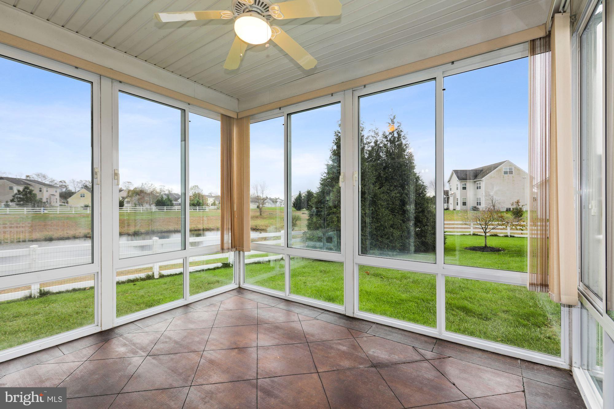 24873 Rivers Edge Road Millsboro, DE 19966 - Photo 22 of 57 Lovely Enclosed Porch