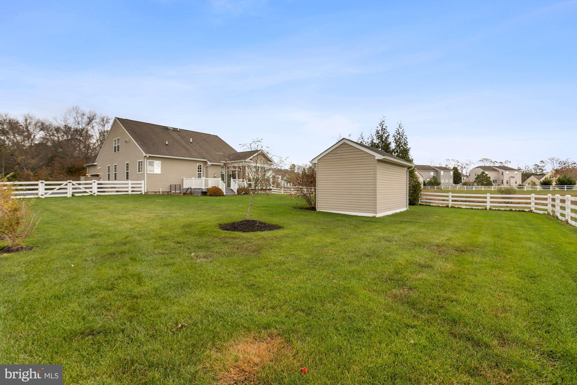 24873 Rivers Edge Road Millsboro, DE 19966 - Photo 50 of 57 Spacious Fenced Rear Yard