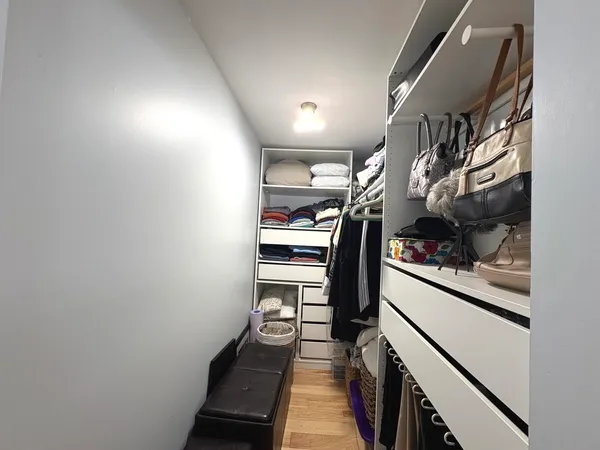 a view of a hallway with stairs