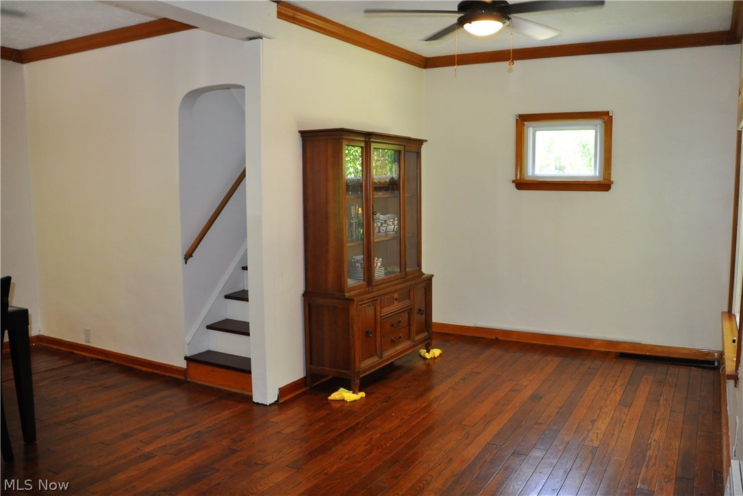 8016 Stone Road Independence, OH 44131 - Photo 5 of 21 Beautiful Hardwood Floors continue from the Living Room into the open Dining Room.