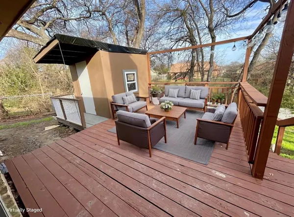 a view of a patio with couches and a table