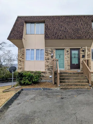 front view of a house with a street