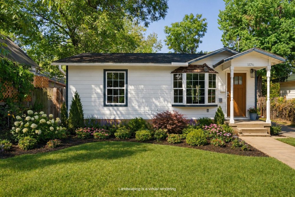 1176 Graham Street Austin, TX 78702 - Photo 1 of 20 a front view of a house with a garden