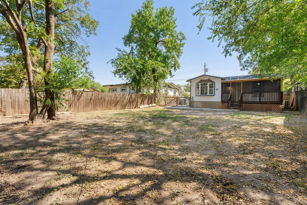 1176 Graham Street Austin, TX 78702 - Photo 14 of 20 a view of a house with a yard