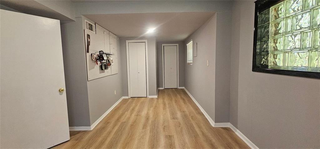 1096 Deleon Court Clarkston, GA 30021 - Photo 21 of 59 a view of entryway with wooden floor