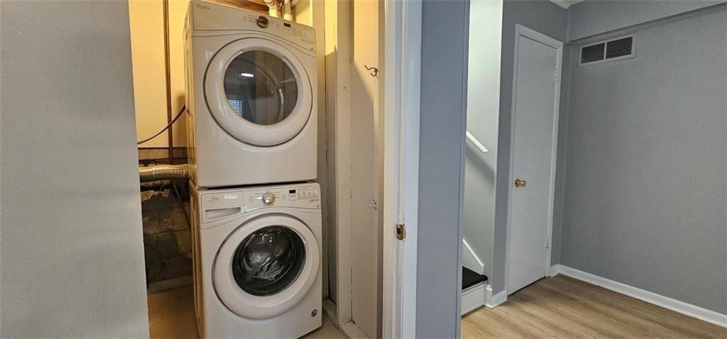 1096 Deleon Court Clarkston, GA 30021 - Photo 22 of 59 a utility room with dryer and washer