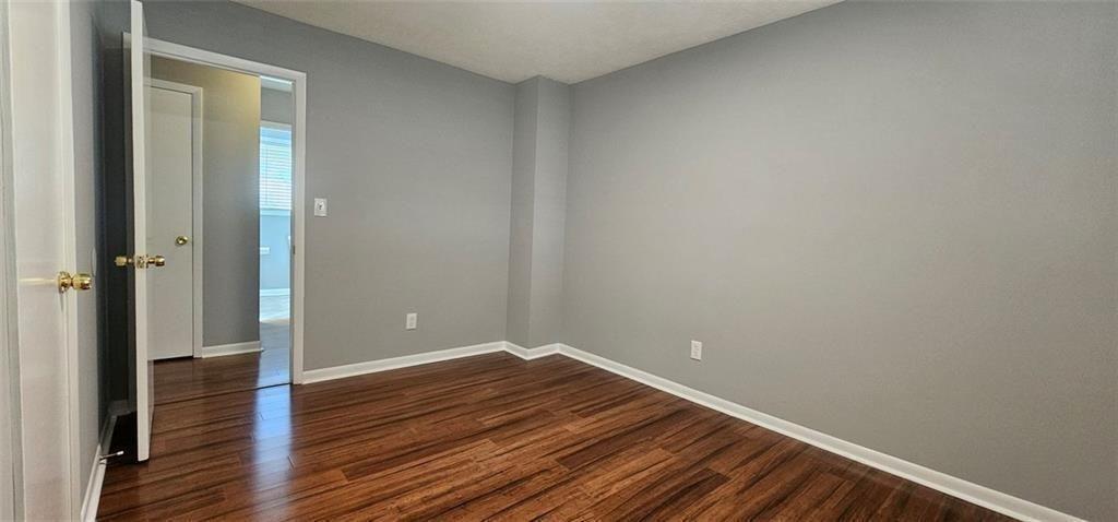 1096 Deleon Court Clarkston, GA 30021 - Photo 27 of 59 a view of a room with wooden floor