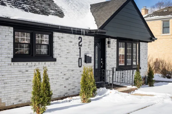 a front view of a house with street