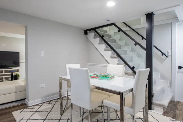 a living room with a rug