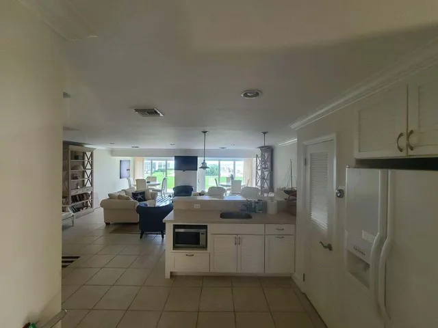 a kitchen with granite countertop lots of counter top space