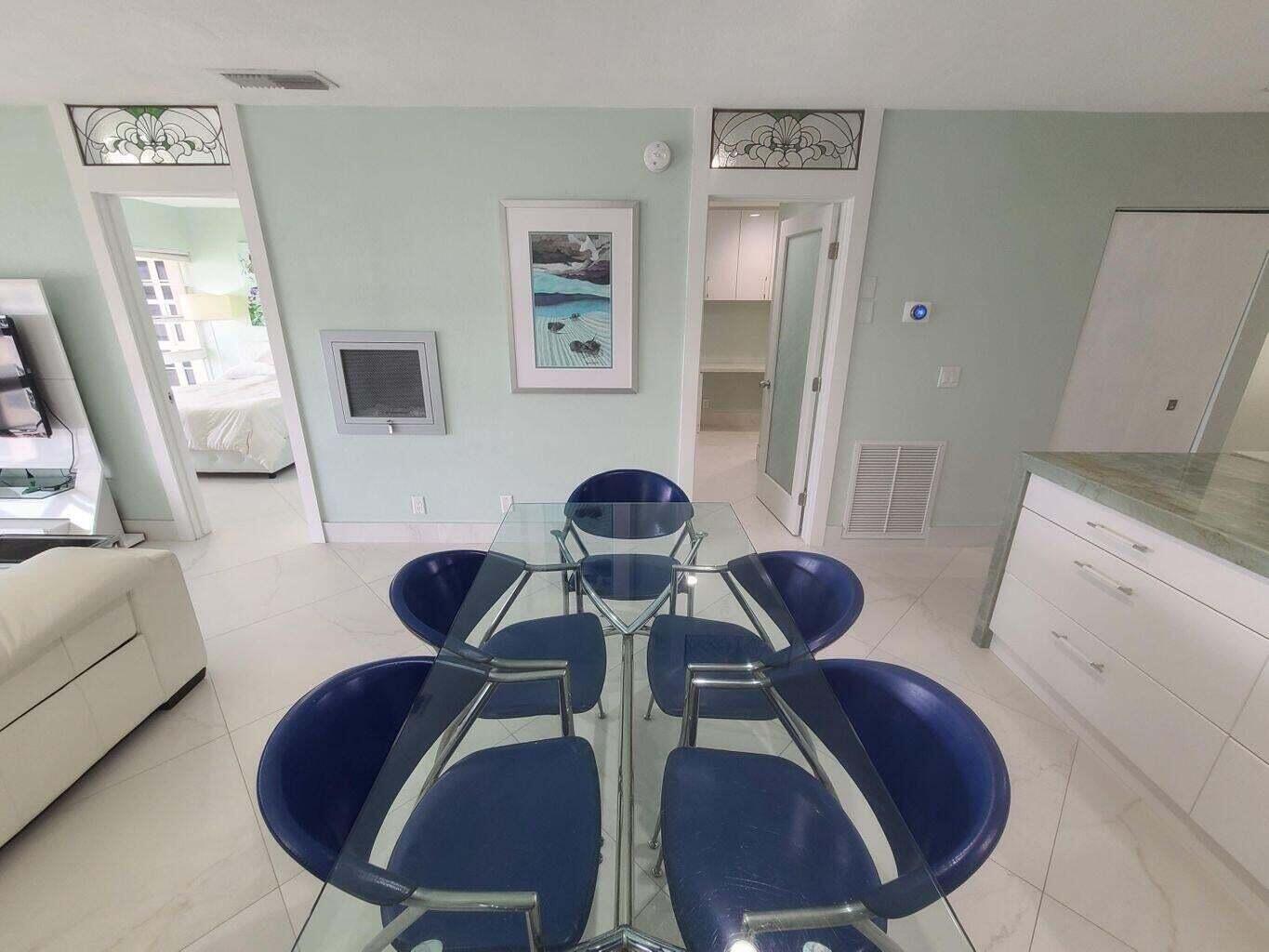 3851 North Ocean Boulevard, Unit 409 Gulf Stream, FL 33483 - Photo 8 of 29 a living room with furniture