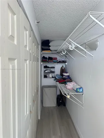 a room with storage and utility