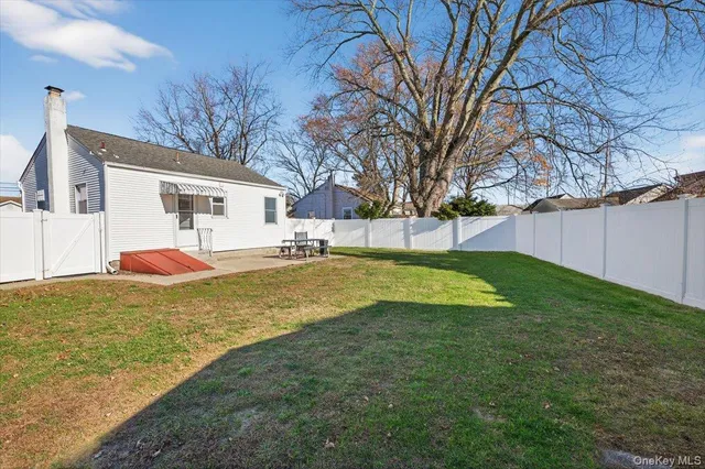 a view of backyard with outdoor space