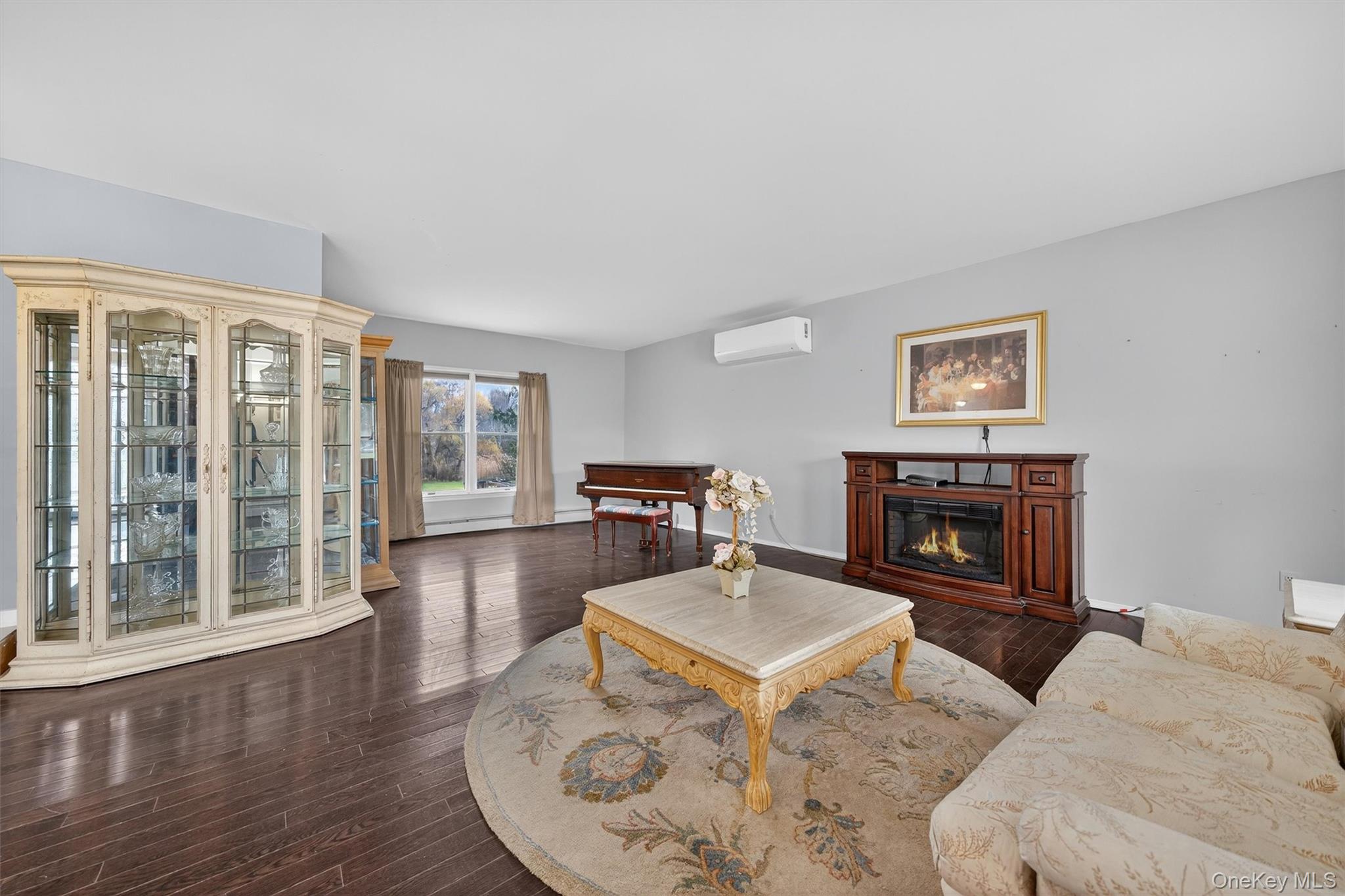 120 Pine Tree Road Monroe, NY 10950 - Photo 11 of 50 a living room with furniture and a fireplace